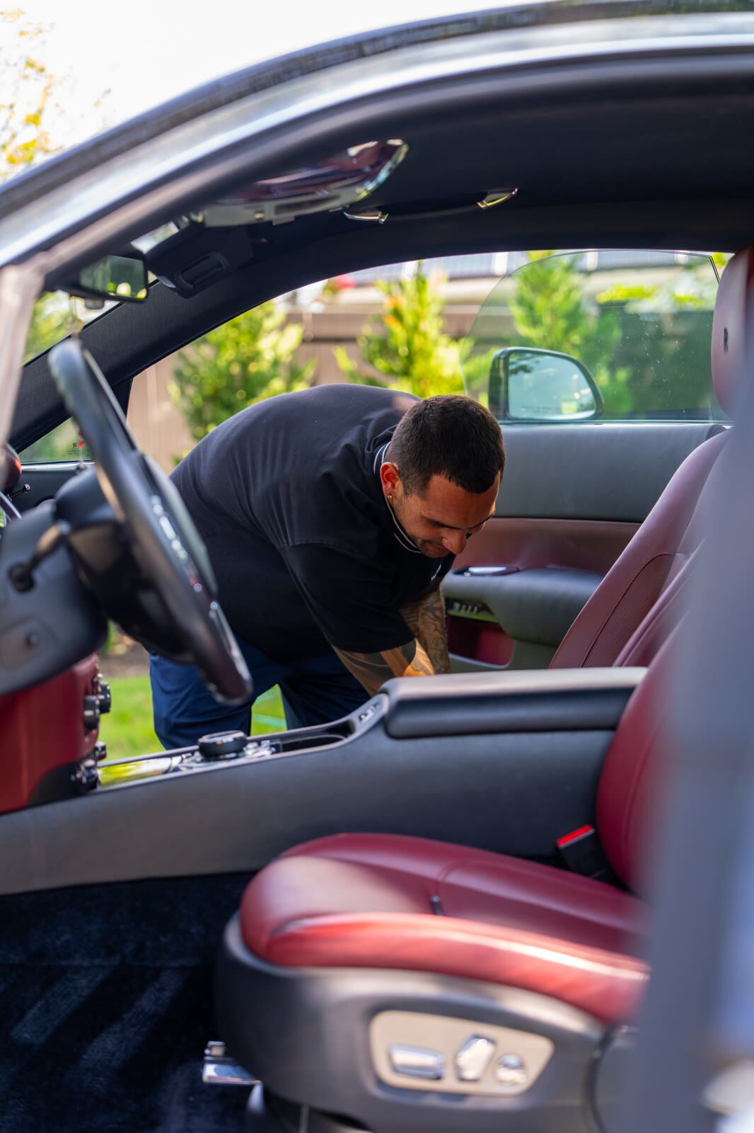 Rolls-Royce Wraith cabin with burgundy leather during deep interior clean